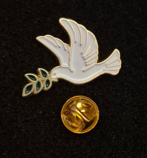 Dove of peace , pin back badge.