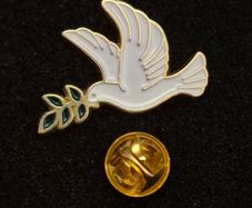 Dove of peace , pin back badge.