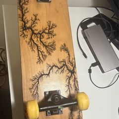 skateboard with burned patterns