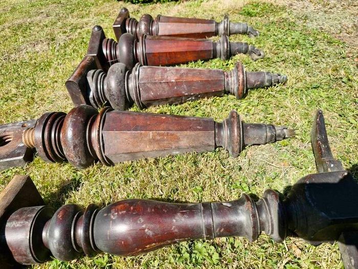 Antique mahogany piano legs with bronze casters