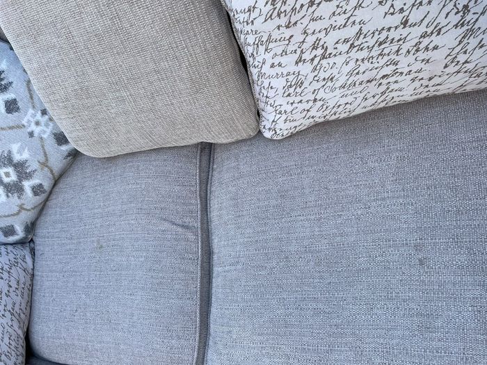 Beige L shaped corner sofa