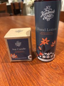 The Handmade Soap Company Hand Lotion ( bitter orange, pink pepper and hay ) and matching candle 70 grams