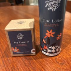 The Handmade Soap Company Hand Lotion ( bitter orange, pink pepper and hay ) and matching candle 70 grams