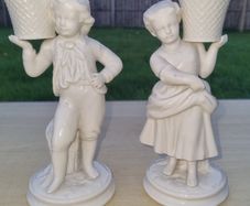 Belleek Pair of porcelain figurines Boy and Girl Basket Carriers / Water Carriers