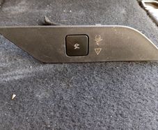 Button for the trunk door