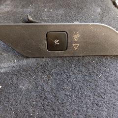 Button for the trunk door