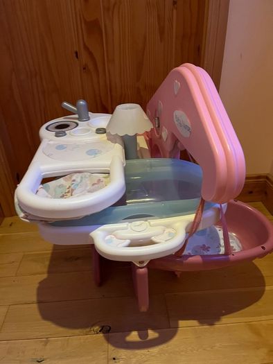 Baby doll play centre with high chair, bath and cot.