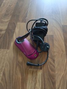 Dyson Corrale hair straightener charging dock and cable.