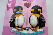 Lego penguins in love