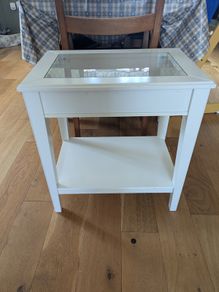 Glass-topped side table