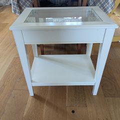 Glass-topped side table