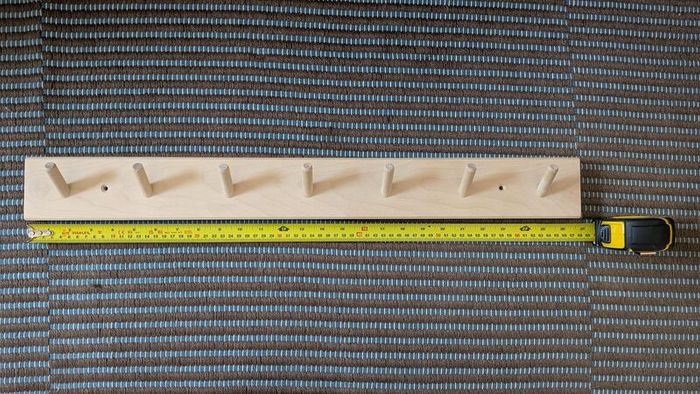 Peg rail coat rack
