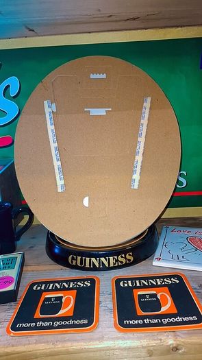 Vintage guinness brass clock