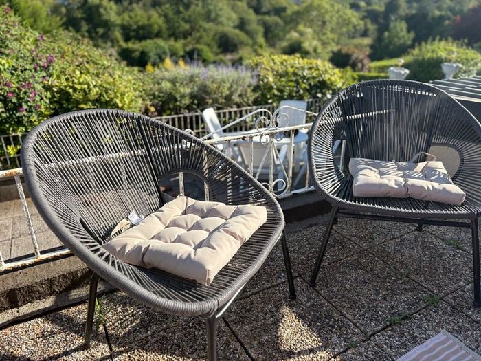Pair of woven garden chairs