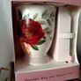 Gift set of a teapot, mug, spoon and coaster. Image 3