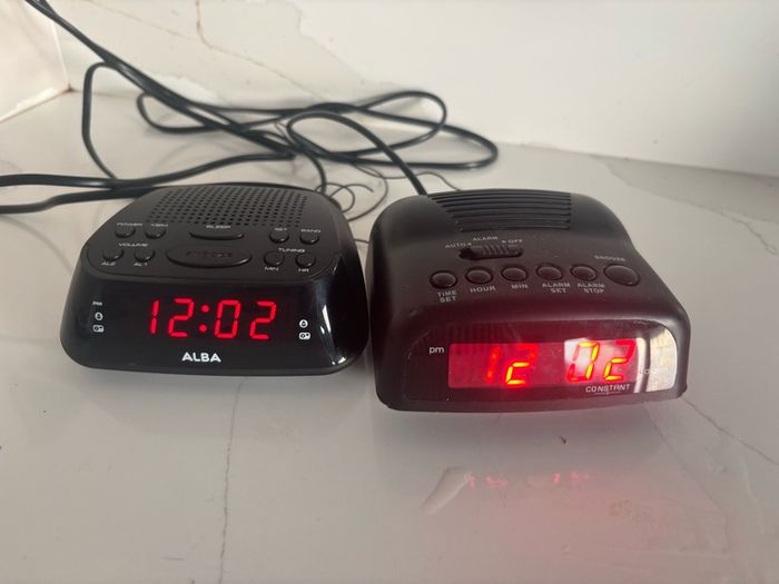 Two alarm clocks