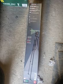 Laser level and tripod