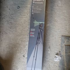 Laser level and tripod