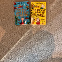 2 books boy who lived with dragons