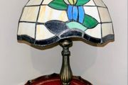Tiffany-style stained glass table lamp featuring a floral motif