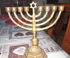 Genuine Old Jewish Menorah Candleholder, A Timeless and Atmospheric Piece, Postage Available Beautiful Jewish menorah made of brass, with a warm golden glow and a classic, elegant appearance. This decorative piece breathes tradition and craftsmanship and 