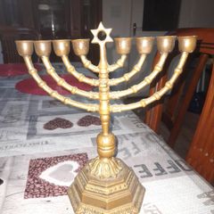 Genuine Old Jewish Menorah Candleholder, A Timeless and Atmospheric Piece, Postage Available Beautiful Jewish menorah made of brass, with a warm golden glow and a classic, elegant appearance. This decorative piece breathes tradition and craftsmanship and 