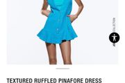 Textured ruffled pinafore dress