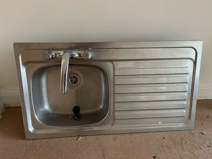 Kitchen sink and taps