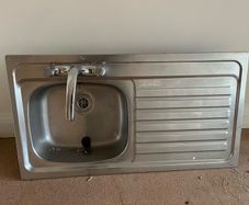 Kitchen sink and taps