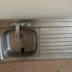 Kitchen sink and taps