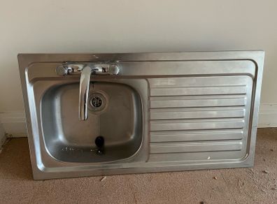 Kitchen sink and taps