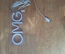 Neon OMG sign