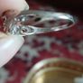 A 925 sterling silver ring with a floating diamond centerpiece. Image 5