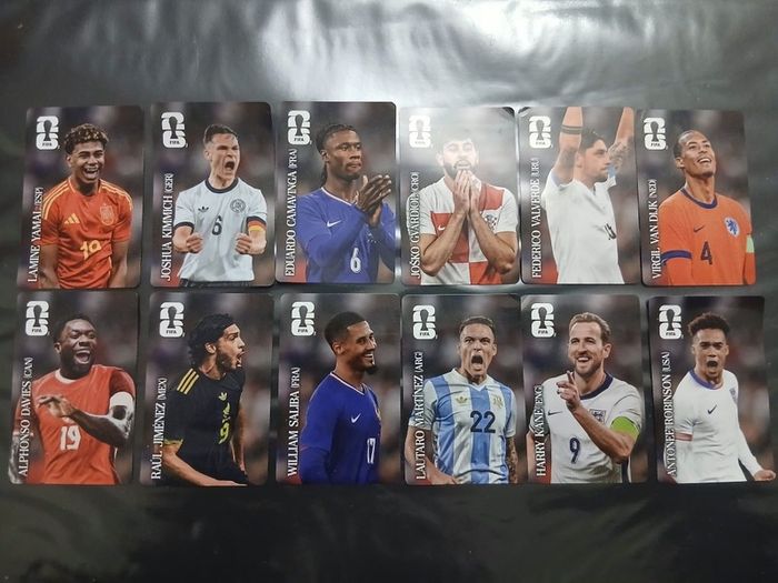 Full set of 12 coke panini stickers