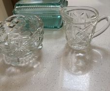 3 pieces of vintage table / dinner ware - A ribbed lidded glass butter dish , vintage 3 footed sugar bowl and cut glass milk jug