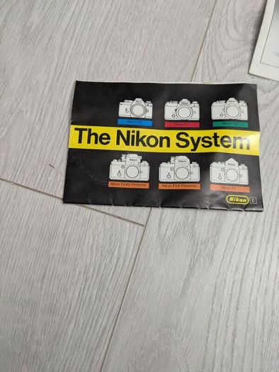 Nikon EM 35mm Film Camera + Series E 50mm f/1.8 Lens