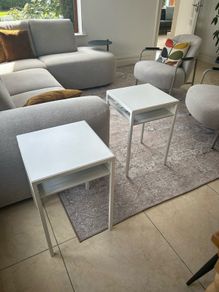Two white side tables