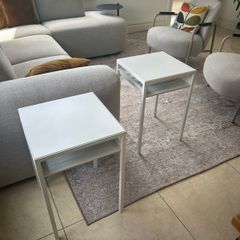 Two white side tables