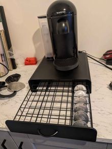 Nespresso Vertuo Black with coffee pods & shelf