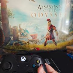 Xbox 1 and controller and assassins creed Odyssey