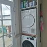 Sage green presses utility room Image 7