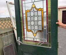 Teak door with stained glass