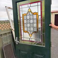 Teak door with stained glass