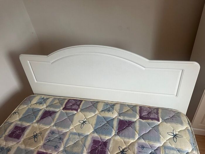 Double Bed with white headboard