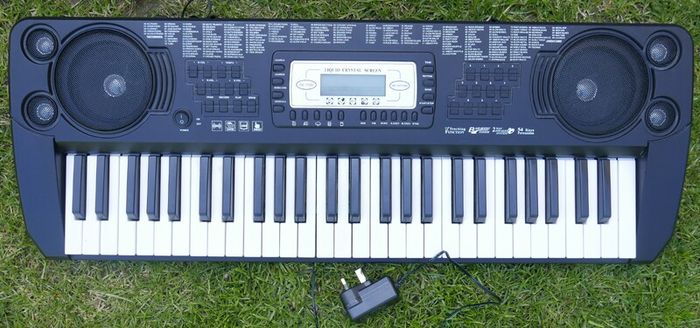 Electronic Keyboard - SK-560 54 Key Keyboard, and keyboard stand