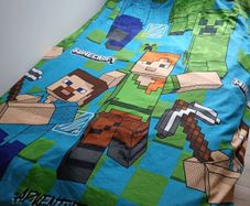 Reversable Minecraft single bed cover set.