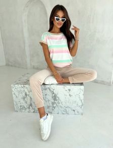 set of trousers, a short-sleeved bat-type blouse