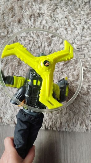 Limited edition This Action Man Air Patrol figure from Hasbro is a 12-inch electronic toy featuring a propeller backpack.The figure wears a distinctive neon yellow and gray flight suit and includes a helmet with a yellow visor.