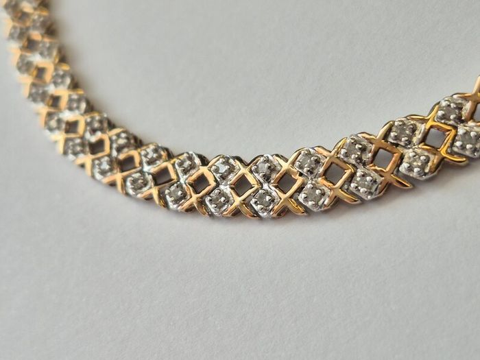 9ct gold diamond bracelet.