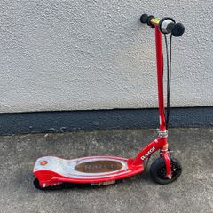 Red Razor electric kids scooter
